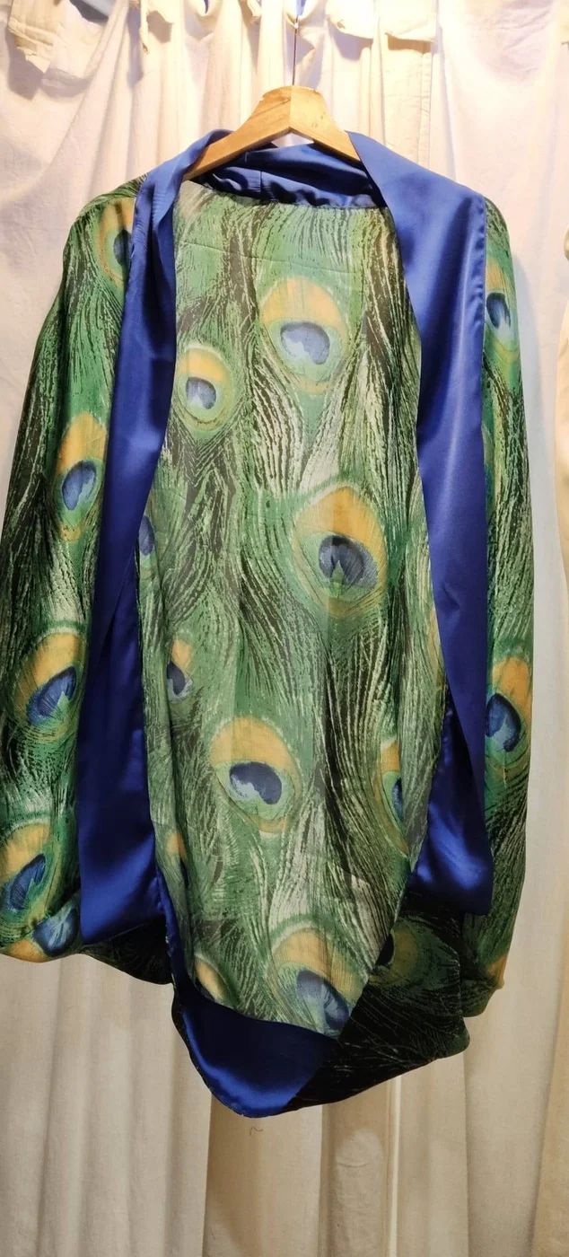 Bespoke peacock feather lined jacket