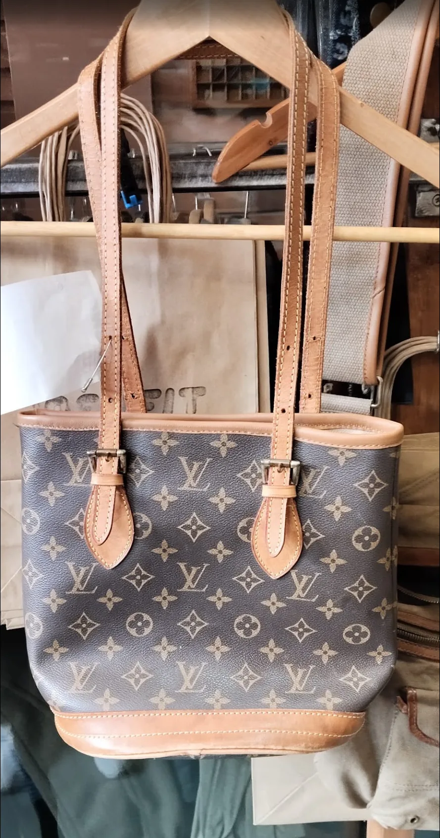 After: Louis Vuitton bag with repaired leather seam and handle attachment