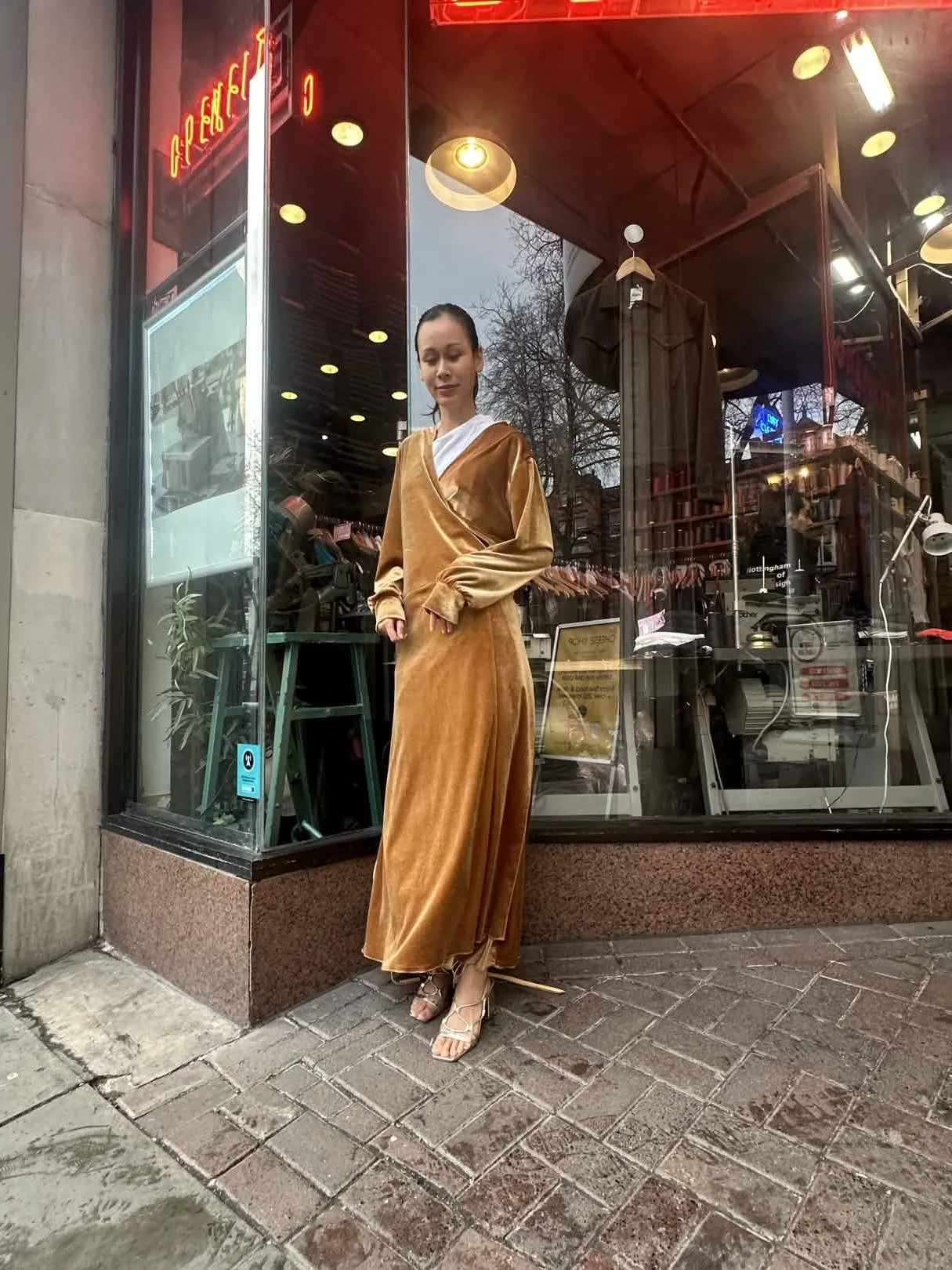 Gold velvet wrap dress, suitable as an occasionwear example