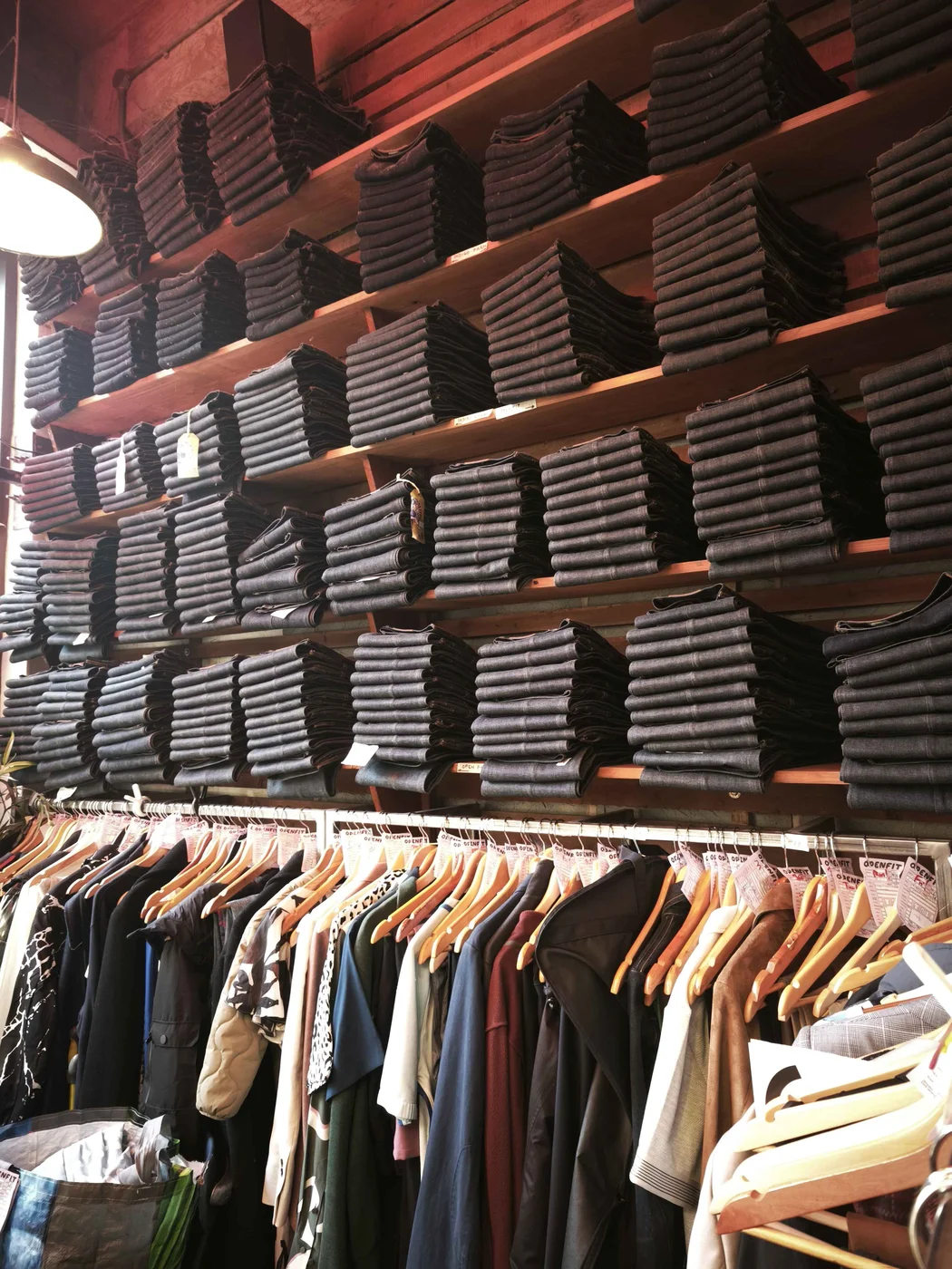 Openfit jeans display with OPENFIT neon sign